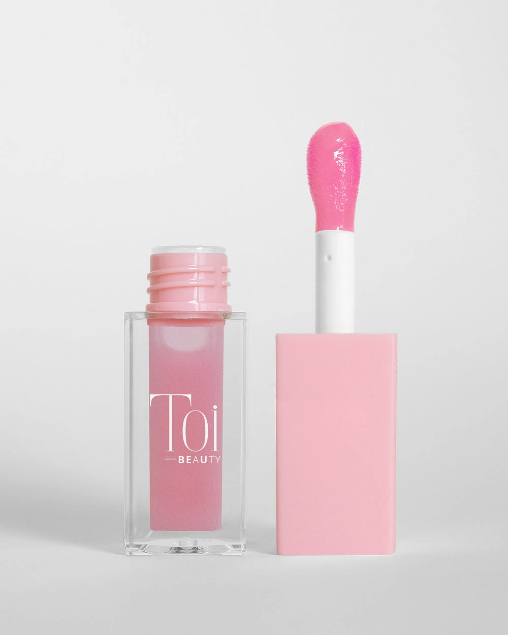 Tinted lip oil in clear packaging for everyday wear. Color Bliss